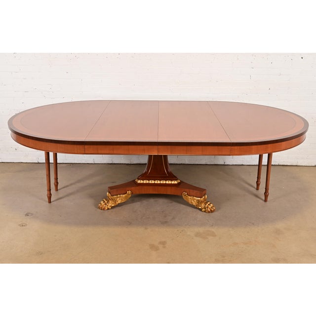 Brown 1980s Baker Furniture Regency Cherry Wood and Parcel Gilt Paw Foot Pedestal Extension Dining Table, Newly Refinished For Sale - Image 8 of 14