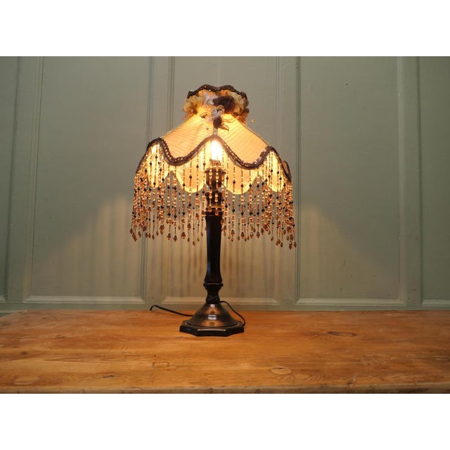 Tall Art Deco Bakelite Table Lamp with Beaded Shade This is a tall slender piece and it come with a extravagant scalloped...