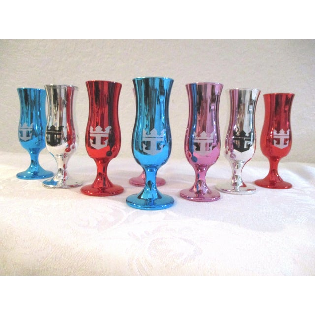 Colorful set of eight multicolor Carnival Cruise "Loving Cup" metallic cordial/shot glasses with silver metallic interior.