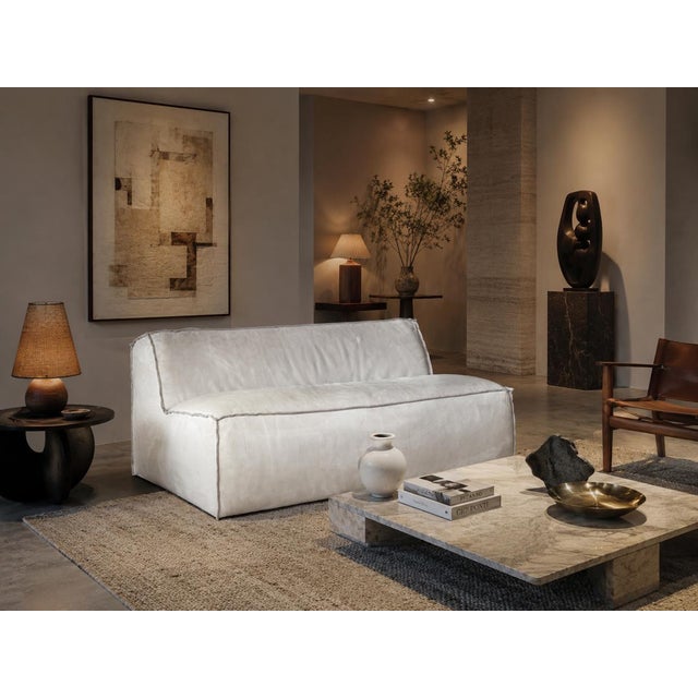 Exceptional Italian “Miami Soft” loveseat sofa designed by Paola Navone for Baxter and made in Italy. Upholstered in...