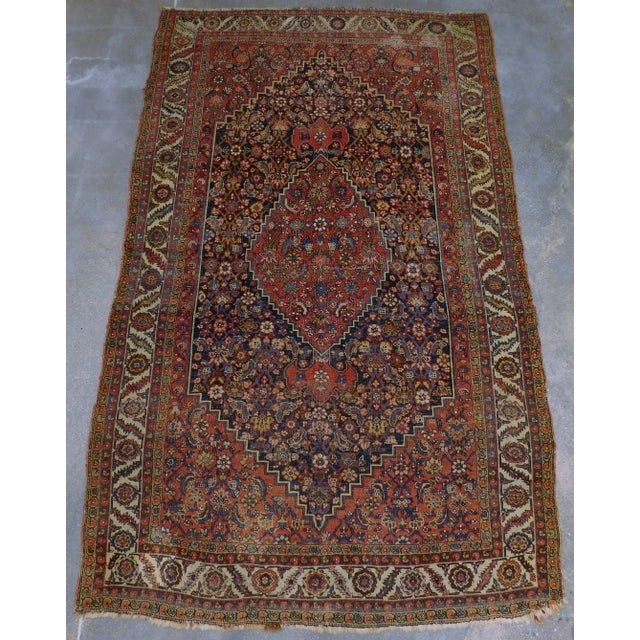 Antique Persian Bijar Rug 5'6"x 9'2" Origin: Persia Design: Central medallion Material: Wool pile on wool foundation...