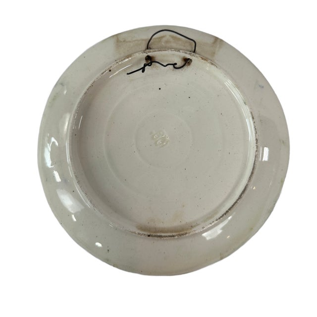 This is an early 20th Century Austrian Art Nouveau majolica wall plaque. This is attributed to Josef Strnact. We have...