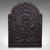 This is an antique church refectory fire back. An English, cast iron fireplace reflector with ecclesiastical taste, dating...