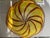 This Piece has been treasured and appears in mint condition. It varies in Diameter from 23 to 25 inches, and 3 to 5 inches...