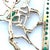 Green 14k Yellow Gold Emerald and Diamond Studded Horse Rider Brooch For Sale - Image 8 of 9