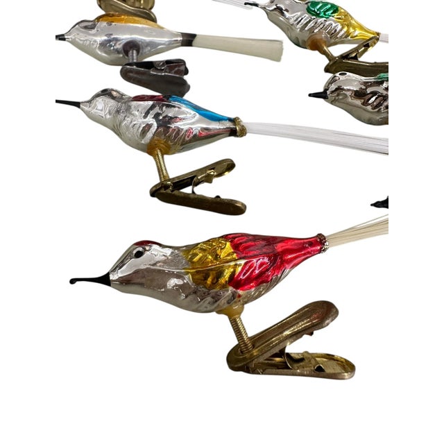 Set of vintage mercury glass bird ornaments — beautifully hand-painted with delicate details and clip-on tails of real...