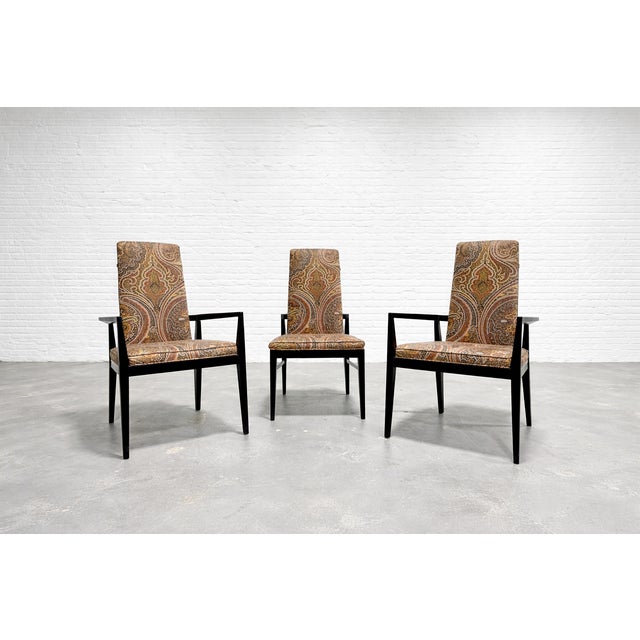 Incredible set of three Mid Century Modern Ebonized Chairs in the most perfect paisley upholstery. The backs are framed...