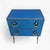Elegant chest of drawers featuring surfaces entirely clad in blue mirror, creating sophisticated reflections of light and...