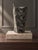 A sculptural Mid-Century Modern ceramic composition by Ester Wallin for Upsala-Ekeby, Sweden, depicting three stacked owls...