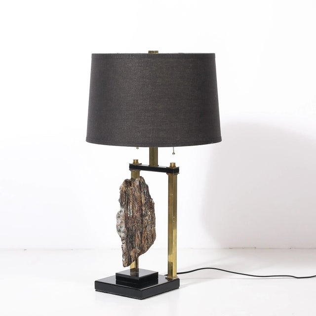 This Mid-Century Modernist table lamp, crafted in France circa 1970, is a striking example of sculptural lighting design...