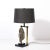 This Mid-Century Modernist table lamp, crafted in France circa 1970, is a striking example of sculptural lighting design...