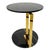 With its asymmetrical design, the Lia side table features two Noir Marble discs atop two Polished Brass stems.