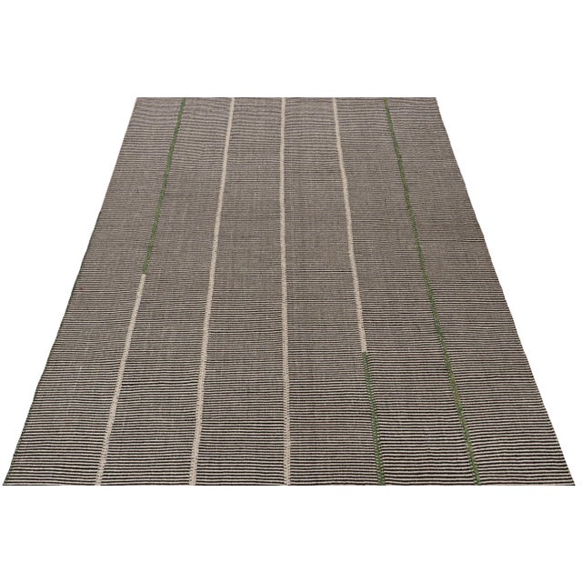 Handwoven in wool, this 10x13 Kilim is from a bold new line of contemporary flatweaves by Rug & Kilim. Further On the...