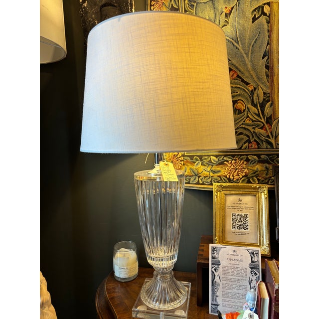 Elegant pair of vintage crystal table lamps featuring beautifully fluted crystal bodies on square lucite bases. Their...