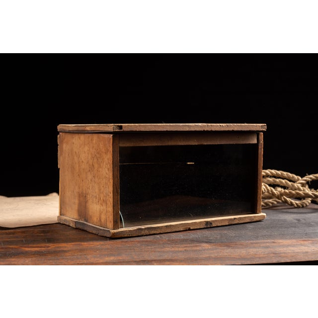 Handpicked by IndustrialArtifact Vintage from the 1920s About this item c. 1920s This antique leather garter display case...