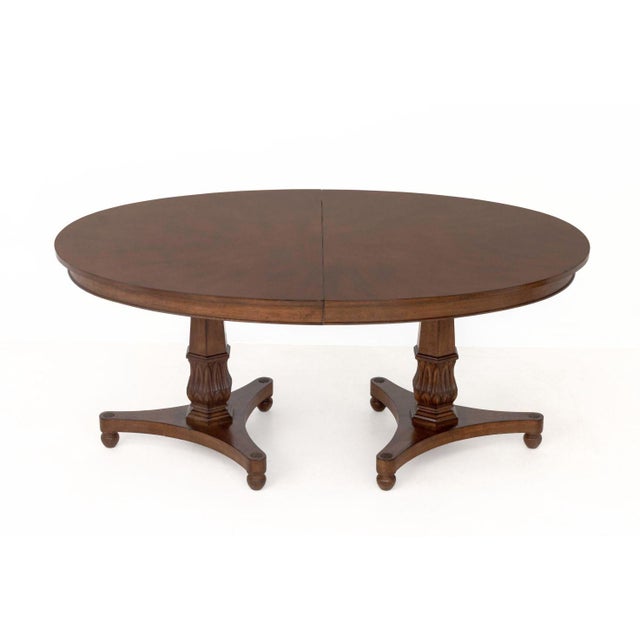 Regency Style Twin Pedestal Extending Dining Table, with three extension leaves. 29.75" H x 68" W x 46" D; fully extended:...