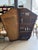An extraordinary antique wooden harp travel case, believed to date to the 1920s, thoughtfully repurposed into a striking...