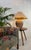 Large ceramic table lamp. Terracotta base with a large conical ‘kraft’ lampshade with a gold interior for optimal warm...