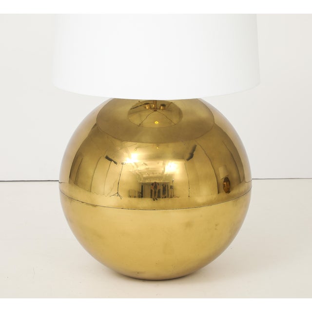 Amazing pair of late 1970's solid brass orb small and large table lamps designed by Karl Springer, in vintage original...