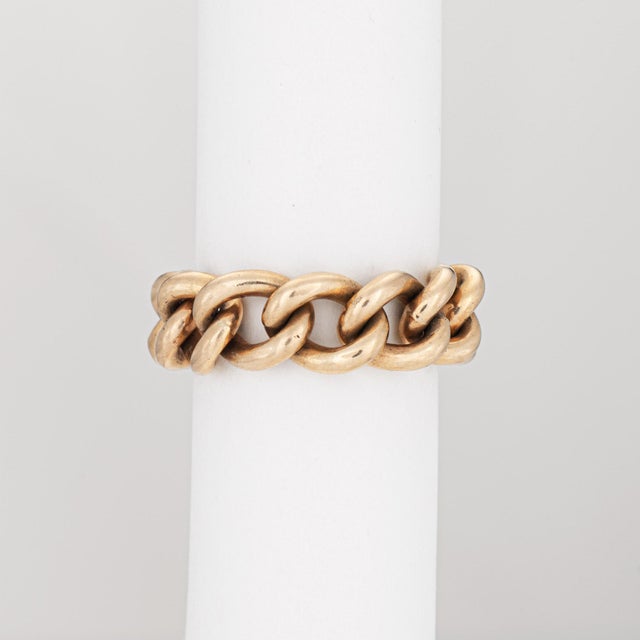 Vintage Tiffany & Co curb link ring crafted in 14 karat yellow gold (circa 1970s). Sculptural and wonderfully tactile,...