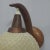 This wall lamp was designed and manufactured in Denmark in the 1950s-1960s. It is composed of a teak wall mount and a...