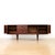 This vintage mid-century credenza was produced by Beautility Furniture during the 1960s. A wonderful minimalist design and...