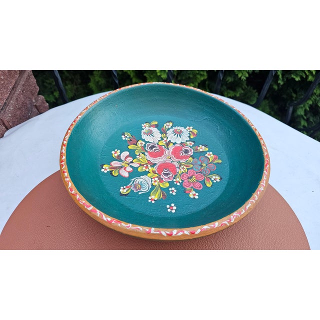 Painted wooden bowl or decorative plate in folk style, 1960s–1970s., dimensions: height 8 cm, diameter 32 cm.