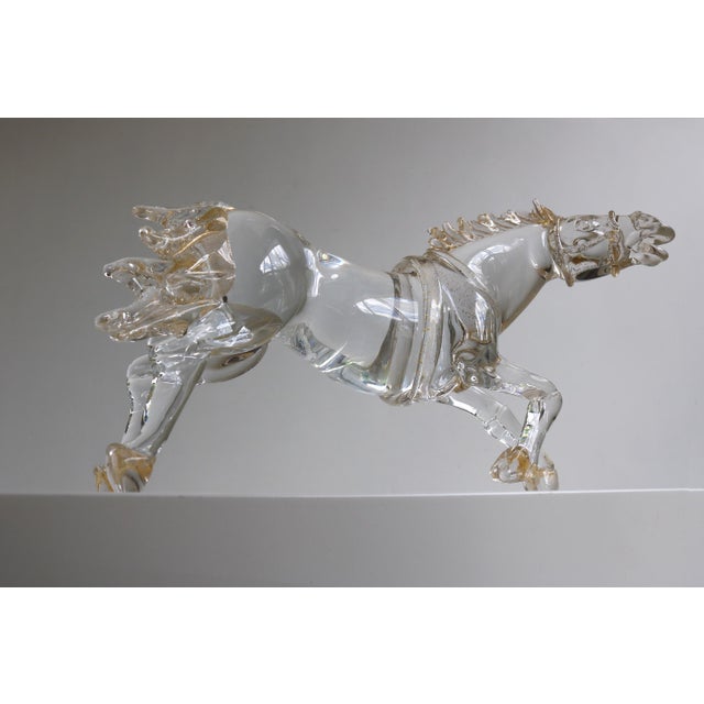 A dynamic Murano glass horse sculpture signed by Italian glass master Arnaldo Zanella. Hand-blown in Murano during the...