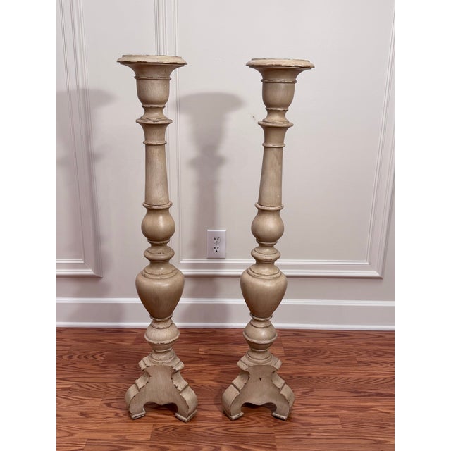 This pair of solid wood floor candlesticks or wood plant stands/pedestals have a strong architectural presence, with...