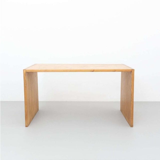 Mid-Century Modern rationalist wood table By unknown manufacturer from France, circa 1960. In original condition, with...