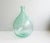 This large glass balloon in light turquoise is a classic French demijohn from the 1950s. Light green / turquoise -colored...