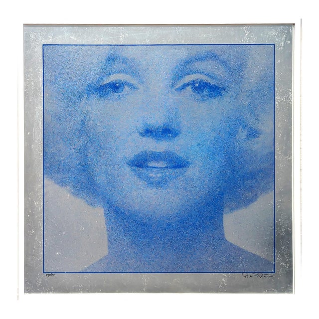 Blue-toned silkscreen portrait print of actress Marilyn Monroe by legendary photographer Bert Stern. The piece features a...