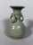 Longquan celadon stoneware vase, Yuan-Ming Dynasty. Incised celadon vase with a lotus flower motif. Globular in shape,...