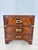 Beautiful English colonial-style, exceptional campaign chest of drawers. Crafted from fine mahogany with a stunning,...