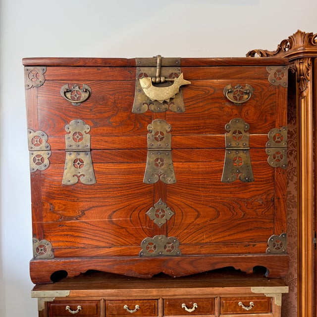Antique Korean Wedding Chest with Fish Lock The top of this beautiful chests folds down once the “secret” fish lock is...