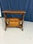 Vintage wooden magazine rack side table. This dual-purpose piece serves as an occasional or bedside table while providing...