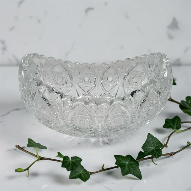 This magnificent bowl weighs an impressive 4.8 pounds. Features extraordinary depth and deep geometric relief cuts that...