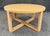 This round coffee table is crafted from solid maple with a natural finish that highlights the wood grain. Its clean-lined...