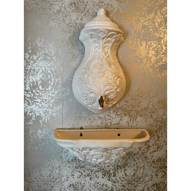 Simple and elegant to add another element to a room. The top piece is 16" H x 9" W x 5" D. The bottom piece is 14" W x 6"...