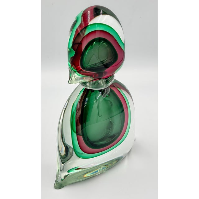 Discover the exquisite beauty of this MCM Murano Sommerso Art Glass Sculpture Perfume Bottle! This stunning piece is a...