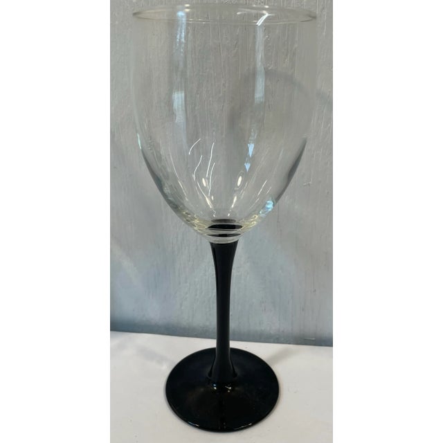 Nice vintage set of black stem wine glasses