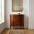 Demi-Lune sideboard in neoclassical style, veneered in various woods. Breccia marble top, body decorated with marquetry,...