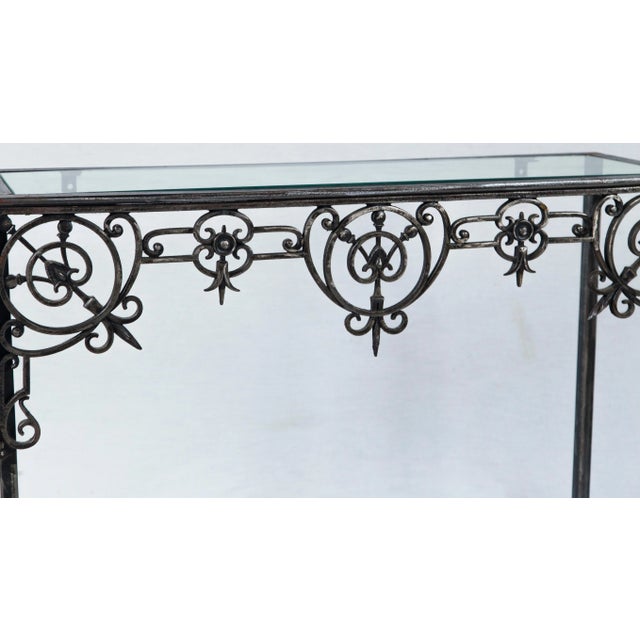 architectural iron custom console table, France. Table was designed around an intricate piece of architectural ornament...