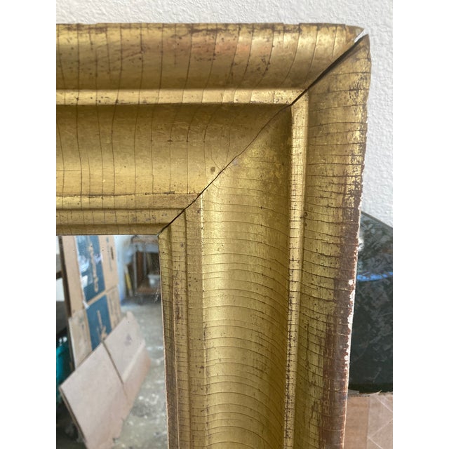 Handsome Early 20th Century Gilded Parlor Mirror. Solid wood frame. Ready to hang.