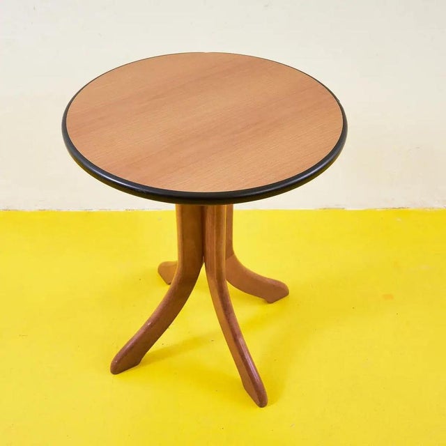 Round Wooden Side Table, in Good conditions. This piece is attributed to the mentioned designer/maker. It has no...