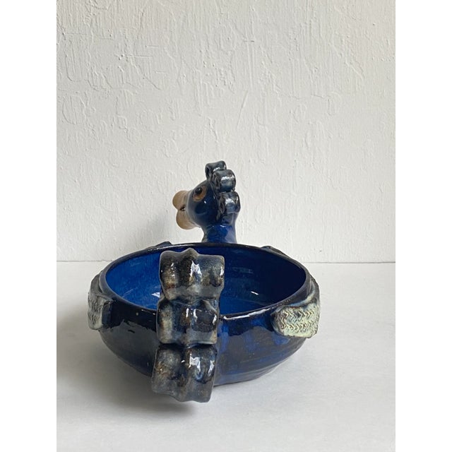 Fabulously whimsical pottery bird dish. Is it a duck? Is it a peacock? You decide. No matter which bird was the muse for...