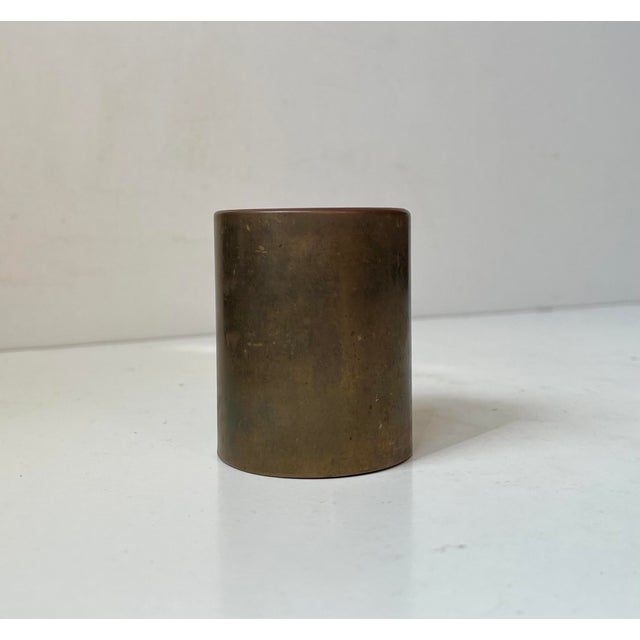 Small cylindrical and heavy vase in patinated bronze. Unknown Scandinavian maker/designer in a style reminiscent of Just...