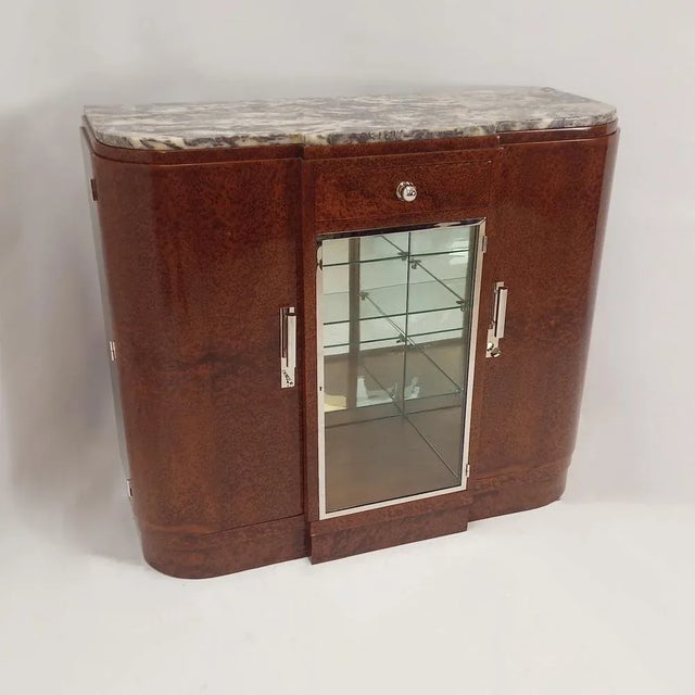 Art Deco Sideboard / Annricht France around 1930, the sideboard with original bird's ahaorn veneer was restored and...