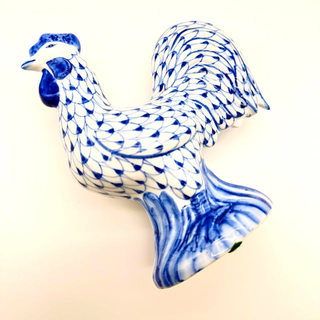 Adorable ceramic Chicken or Hen with Cobalt Blue fishnet pattern, made by Andrea by Sadek. Maker’s sticker is on the...