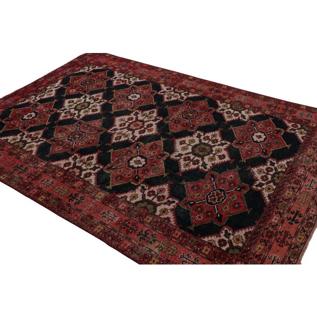 From our new collection of overdyed rugs, a vintage 6x8 Persian rug originating circa 1970-1980. Hand knotted in wool on...